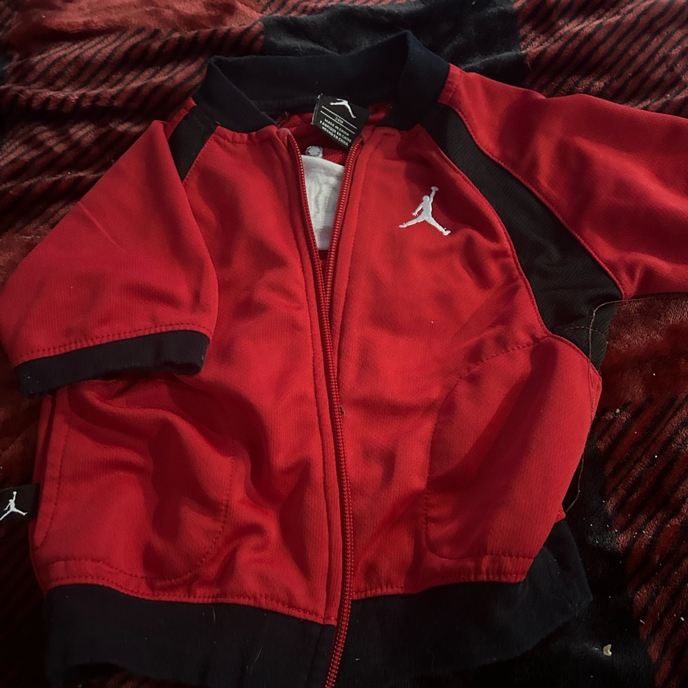 Jordan quarter sleeve zip-up jesery